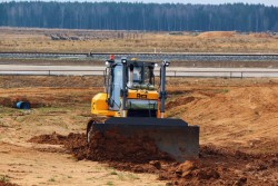 Особенности применения бульдозера в сфере строительства: для чего он нужен
