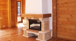 Камин для дома из бруса: разновидности и выбор оптимального варианта