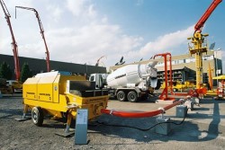 Какими достоинствами обладают стационарные бетононасосы и в каких сферах их применяют