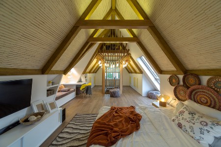 Мансардный этаж в доме: основные характеристики и рекомендации обустройства